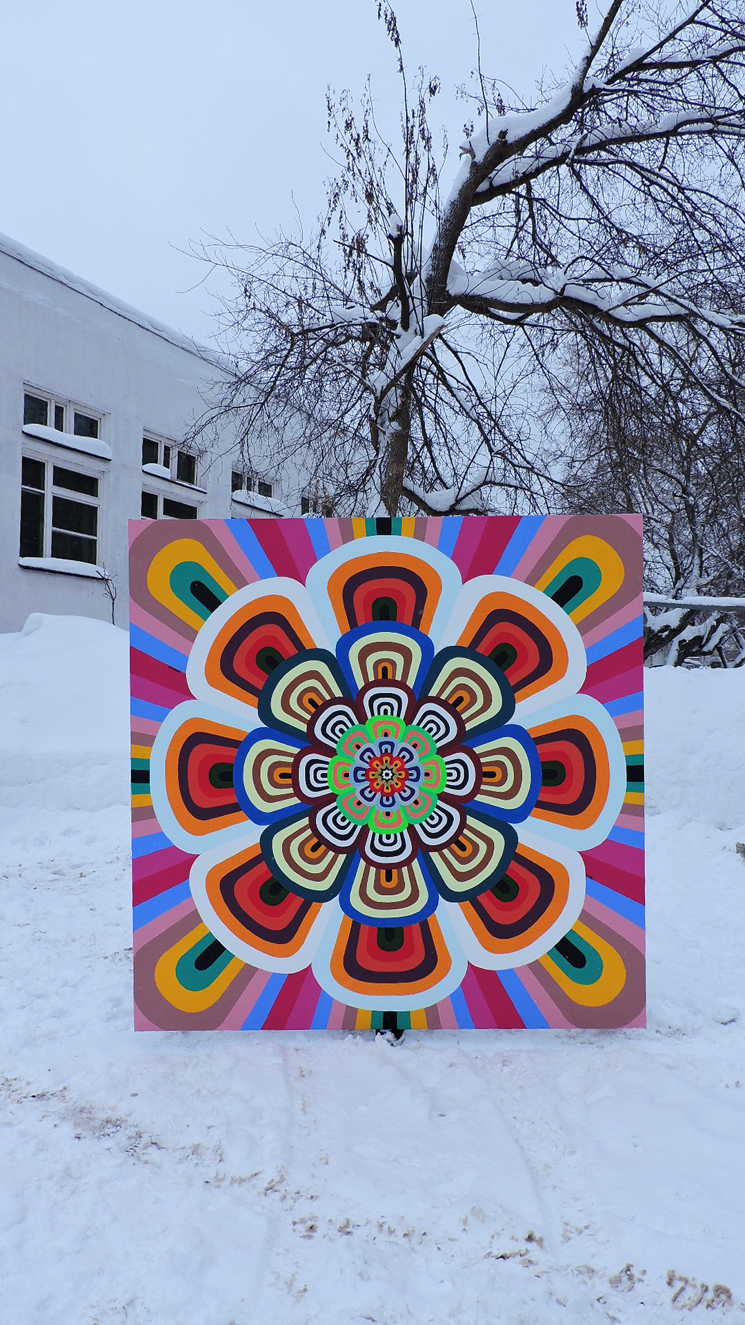A huge picture on canvas with the image of mandala